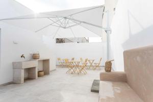 Posezení v ubytování Dimora dei maestri-Camera con veranda e bagno privati