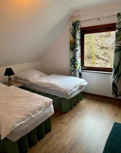 Postel nebo postele na pokoji v ubytování Waldseele Appartement