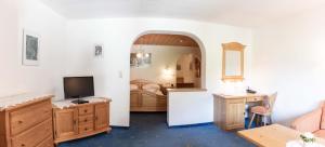 TV a/nebo společenská místnost v ubytování Hotel Rotlechhof