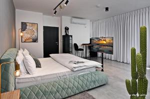 Postel nebo postele na pokoji v ubytování Y HOUSE SUITES