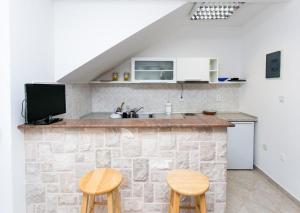 Kuchyň nebo kuchyňský kout v ubytování Guest House Zaton - Zaton Veliki