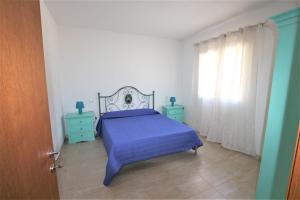 A bed or beds in a room at SHR Badesi