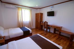 Postel nebo postele na pokoji v ubytování Casa Simeon