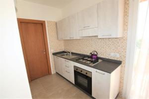 A kitchen or kitchenette at SHR Badesi
