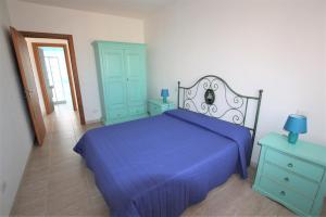 A bed or beds in a room at SHR Badesi