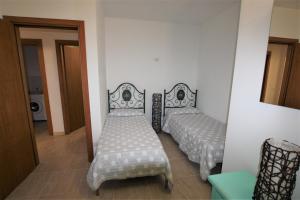 A bed or beds in a room at SHR Badesi