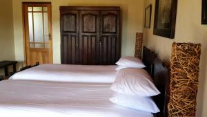 Krevet ili kreveti u jedinici u objektu Wagendrift Lodge