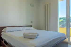 Letto o letti in una camera di ETOILE - Narramondo Villas