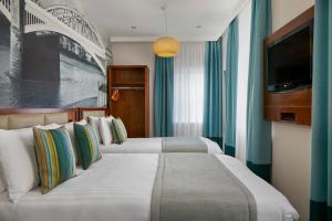 Cama o camas de una habitación en Seraphine Hammersmith Hotel