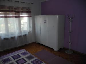 Postel nebo postele na pokoji v ubytování Apartments JASMINKA