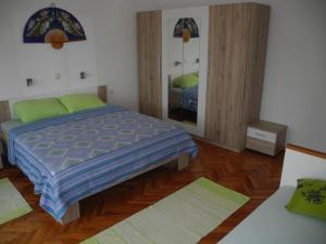 Postel nebo postele na pokoji v ubytování Apartments JASMINKA