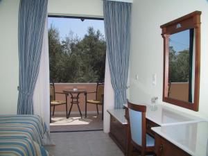 A balcony or terrace at Florena Hotel
