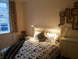 Ένα ή περισσότερα κρεβάτια σε δωμάτιο στο Montrose Apartment