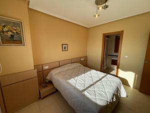 Posteľ alebo postele v izbe v ubytovaní Apartamento Agua Marina I REF 038