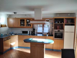 Kuchyň nebo kuchyňský kout v ubytování Ferienwohnung Maxl