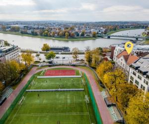 an aerial view of a tennis court next to a river at Stylish apartment close to Wawel, Old Town Studio, Main Sq. 3 min in Kraków