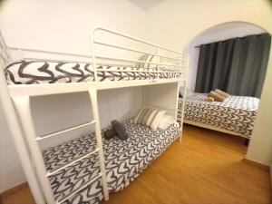 Posteľ alebo postele v izbe v ubytovaní Apartamentos Medano - Marineda Medano