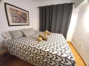 Posteľ alebo postele v izbe v ubytovaní Apartamentos Medano - Marineda Medano
