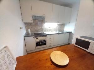 Kuchyňa alebo kuchynka v ubytovaní Apartamentos Medano - Marineda Medano