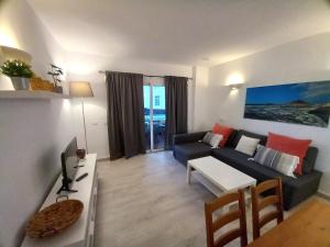 Posedenie v ubytovaní Apartamentos Medano - Marineda Medano