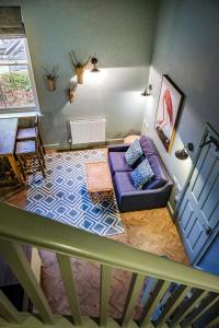 Tempat tidur dalam kamar di The Globe Inn