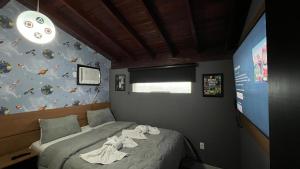 Cama ou camas em um quarto em Hotel La Serena