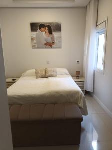 Postel nebo postele na pokoji v ubytování Casa para Veraneio em Torres + 21 fotografií