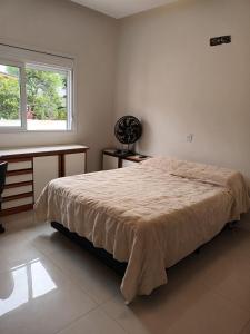 Posteľ alebo postele v izbe v ubytovaní Casa para Veraneio em Torres