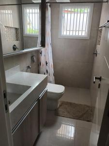 Koupelna v ubytování Casa para Veraneio em Torres