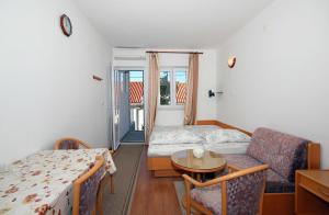 Posteľ alebo postele v izbe v ubytovaní Apartments Near Old Town