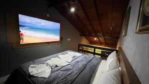 Cama ou camas em um quarto em Hotel La Serena