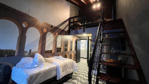 Cama ou camas em um quarto em Hotel La Serena
