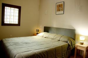 Łóżko lub łóżka w pokoju w obiekcie Gite en Provence proche Avignon