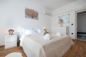Posteľ alebo postele v izbe v ubytovaní Holiday home SANT'ANNA