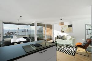 Ruang duduk di ANYTIME - Apartments an der Uferpromenade