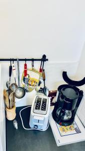 Kuchnia lub aneks kuchenny w obiekcie Kerhos - appartement vue mer