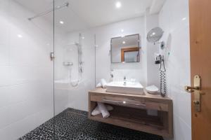 Kúpeľňa v ubytovaní Wellness Aparthotel "Lechlife" incl Pool - 400m zum LIFT