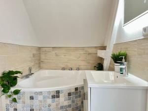 Koupelna v ubytování Duplex Villa Dünenbrise