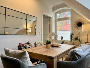 Posezení v ubytování Duplex Villa Dünenbrise