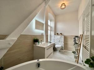 Koupelna v ubytování Duplex Villa Dünenbrise