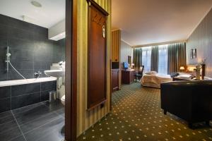 Postel nebo postele na pokoji v ubytování Hotel Morris Relax & Wellness