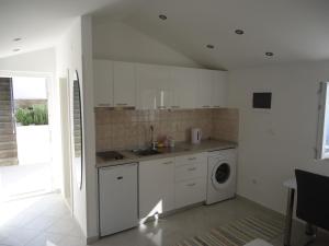 Kuchyňa alebo kuchynka v ubytovaní Apartment Prime Dubrovnik
