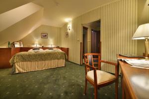 Postel nebo postele na pokoji v ubytování Hotel Morris Relax & Wellness
