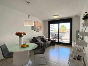 Posedenie v ubytovaní Moderno apartamento a 500 m de la playa