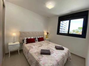 Posteľ alebo postele v izbe v ubytovaní Moderno apartamento a 500 m de la playa