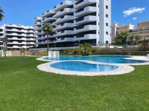 Bazén v ubytovaní Moderno apartamento a 500 m de la playa alebo v jeho blízkosti