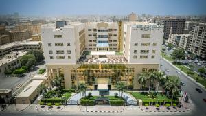 Triumph Plaza Hotel في القاهرة: اطلالة جوية على مبنى في مدينة