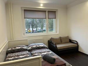 Voodi või voodid majutusasutuse Apartment Charkovska toas