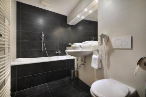 Koupelna v ubytování Hotel Morris Relax & Wellness