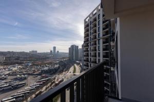a view of a city from a balcony of a building at Belgrade Waterfront Lux 2 in Belgrade